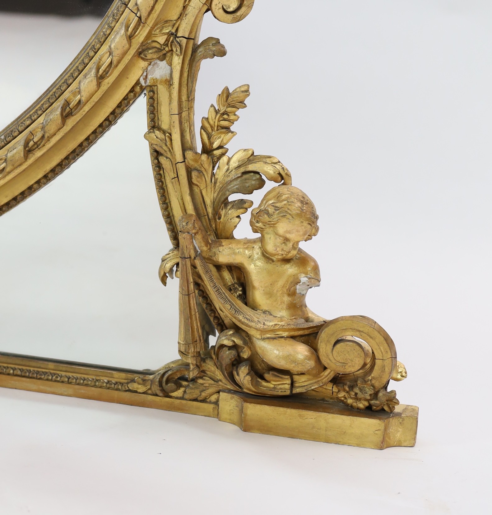 A Victorian giltwood and gesso overmantel mirror, width 176cm height 122cm
